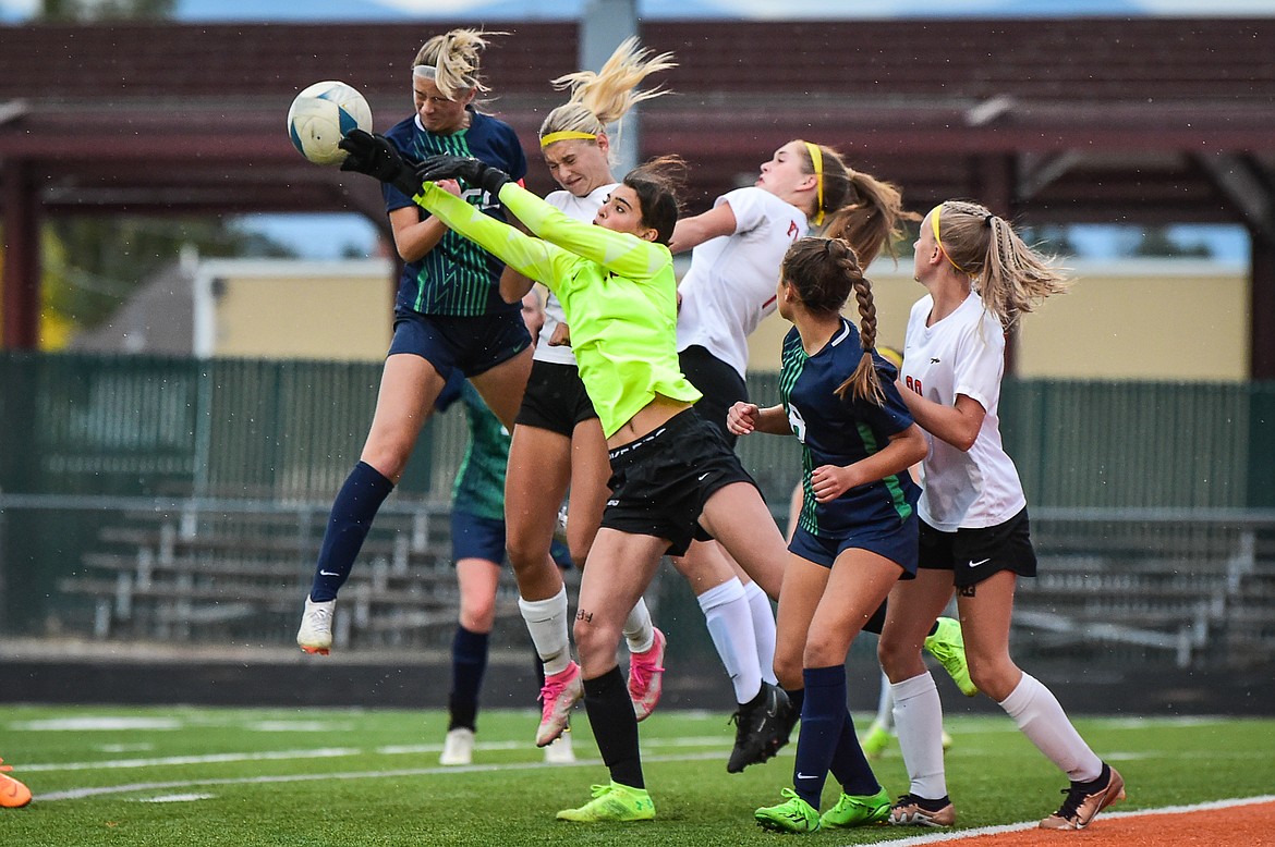 Flathead keeper Joy Sund punches a corner kick out of the zone in the first half against Glacier at Legends Stadium on Thursday, Sept. 21. (Casey Kreider/Daily Inter Lake)