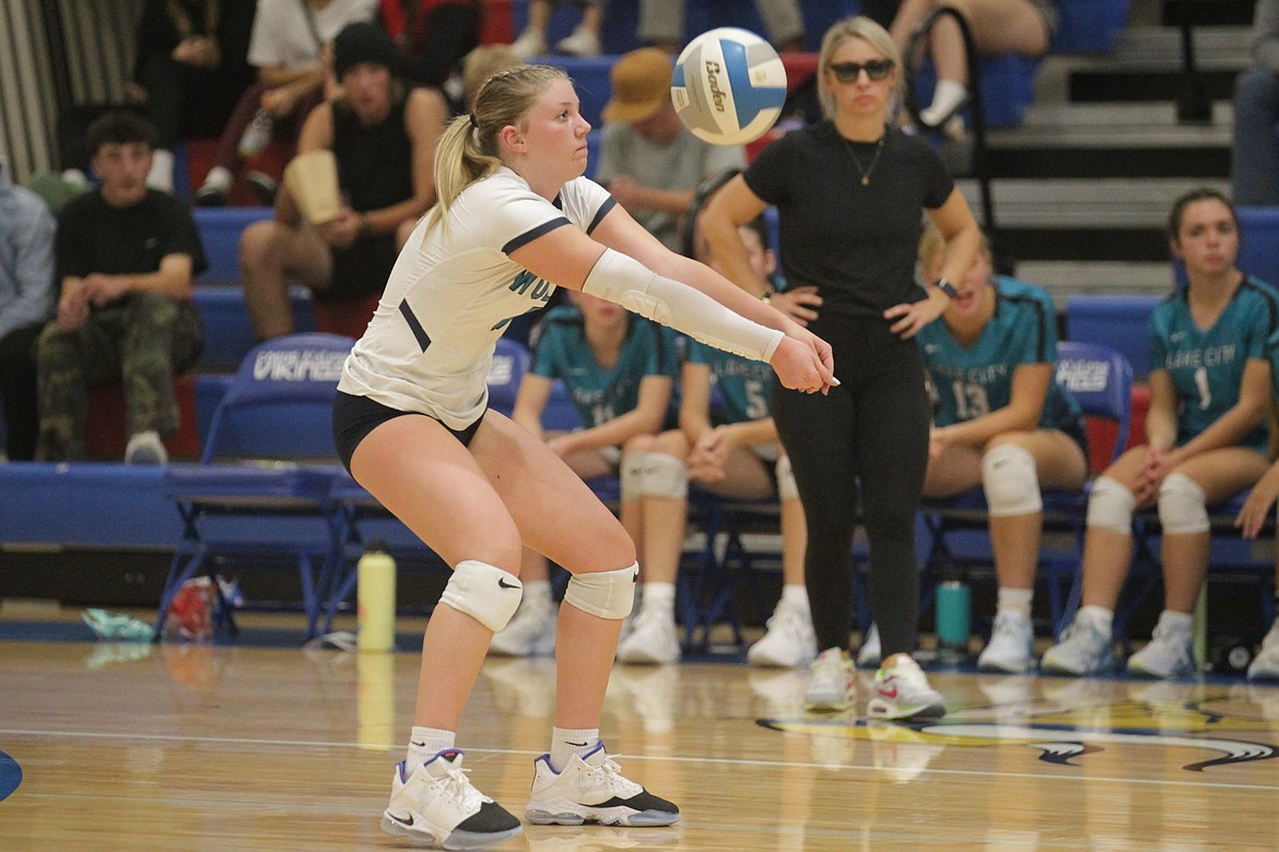 MARK NELKE/Press
Lake City libero Daphne Neeley passes serve Thursday night vs. Coeur d'Alene at Viking Court.