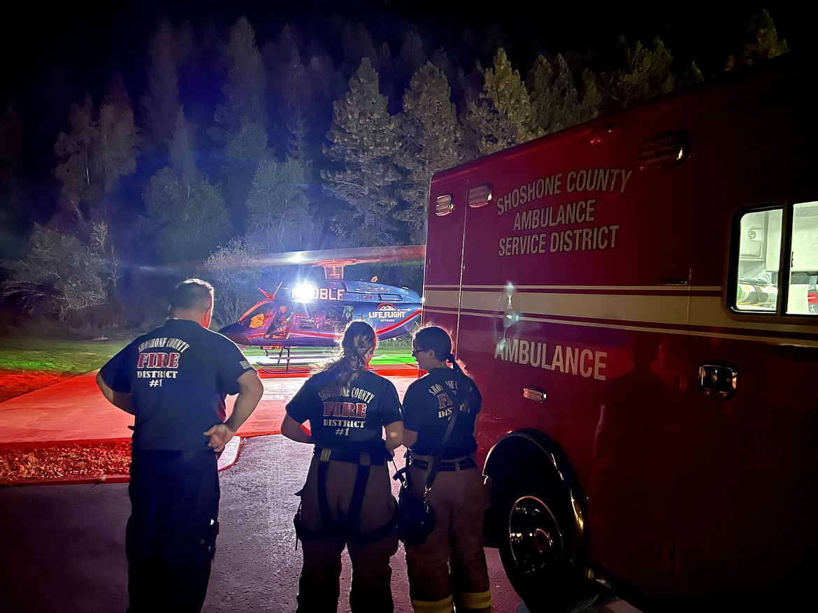EMS crews from Shoshone County Fire District #1 watch as a LifeFlight helicopter takes off – this was one of several LifeFlight calls that occurred in Shoshone County over the past week.