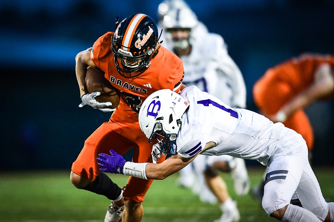 Flathead wide receiver Ben Bliven (2) picks up yardage on a reception in the third quarter against Butte at Legends Stadium on Friday, Sept. 22. (Casey Kreider/Daily Inter Lake)