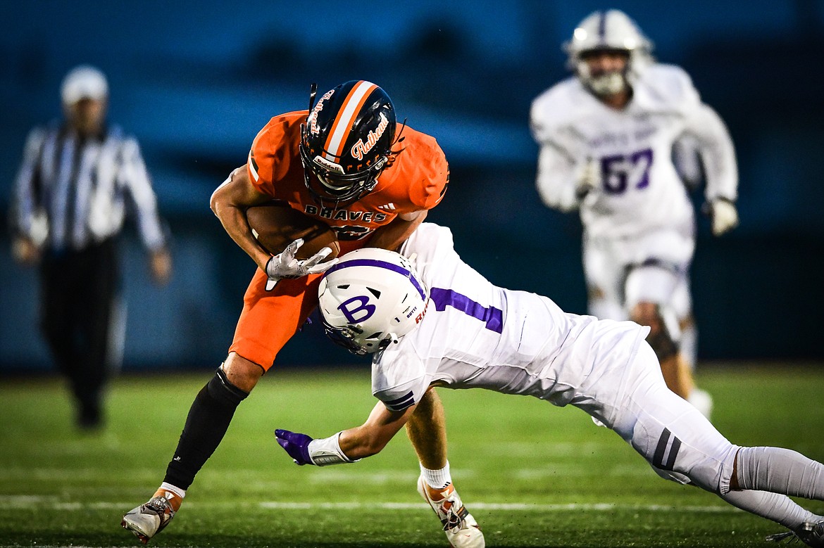 Flathead wide receiver Ben Bliven (2) picks up yardage on a reception in the third quarter against Butte at Legends Stadium on Friday, Sept. 22. (Casey Kreider/Daily Inter Lake)