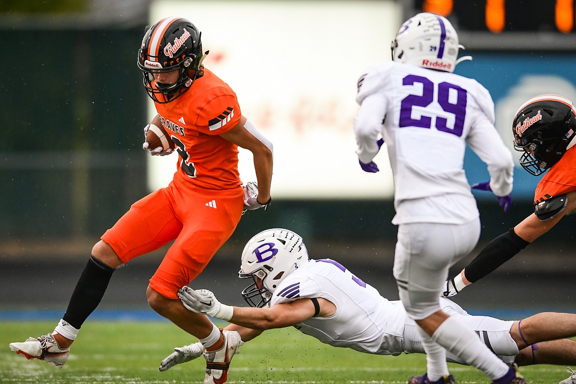 Flathead wide receiver Ben Bliven (2) looks for running room on a run in the first quarter against Butte at Legends Stadium on Friday, Sept. 22. (Casey Kreider/Daily Inter Lake)