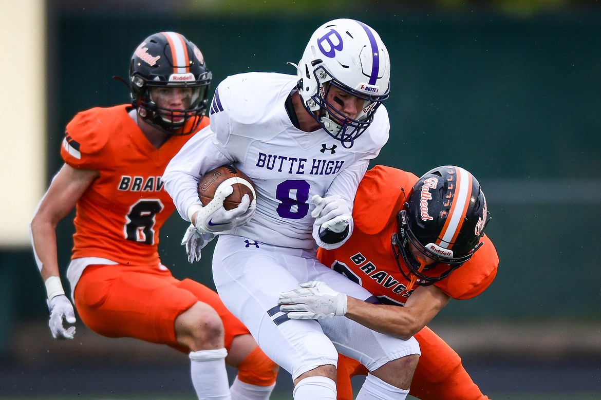 Butte wide receiver Hudson Luedtke (8) is brought down by Flathead safety Brody Thornsberry (88) in the first quarter at Legends Stadium on Friday, Sept. 22. (Casey Kreider/Daily Inter Lake)