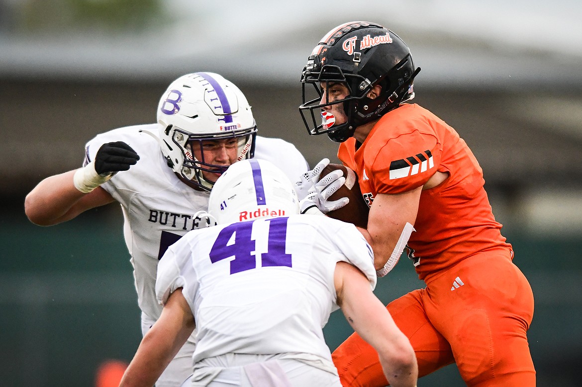 Flathead running back Jaden Williams (1) looks for running room in the second quarter against Butte at Legends Stadium on Friday, Sept. 22. (Casey Kreider/Daily Inter Lake)