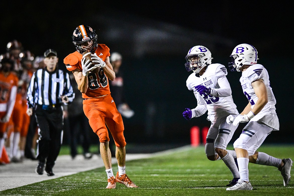 Flathead wide receiver Brody Thornsberry (88) pulls in a long reception along the sideline in the fourth quarter against Butte at Legends Stadium on Friday, Sept. 22. (Casey Kreider/Daily Inter Lake)