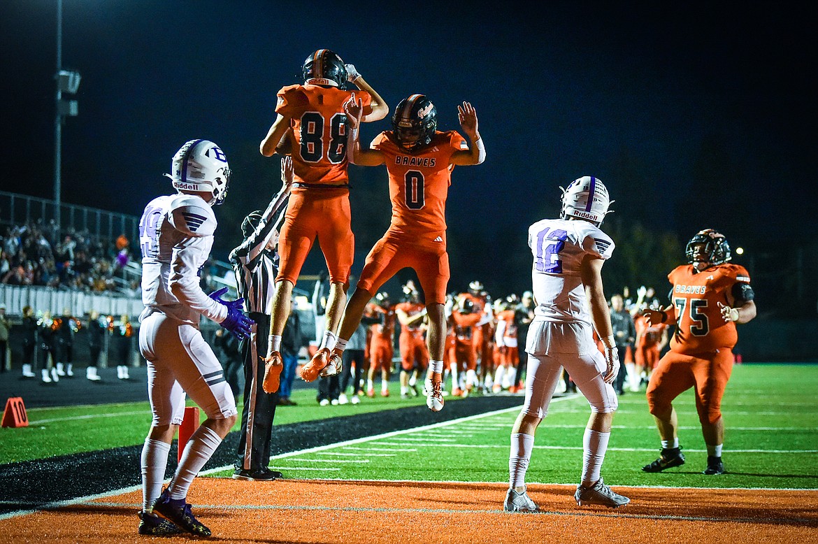 Flathead wide receivers Brody Thornsberry (88) and Tim Zundel (0) celebrate after Thornsberry's touchdown reception in the fourth quarter against Butte at Legends Stadium on Friday, Sept. 22. (Casey Kreider/Daily Inter Lake)