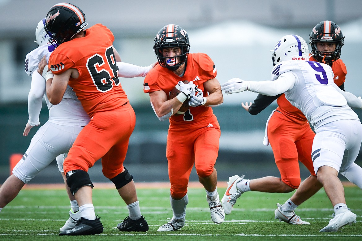 Flathead running back Jaden Williams (1) looks for running room in the second quarter against Butte at Legends Stadium on Friday, Sept. 22. (Casey Kreider/Daily Inter Lake)