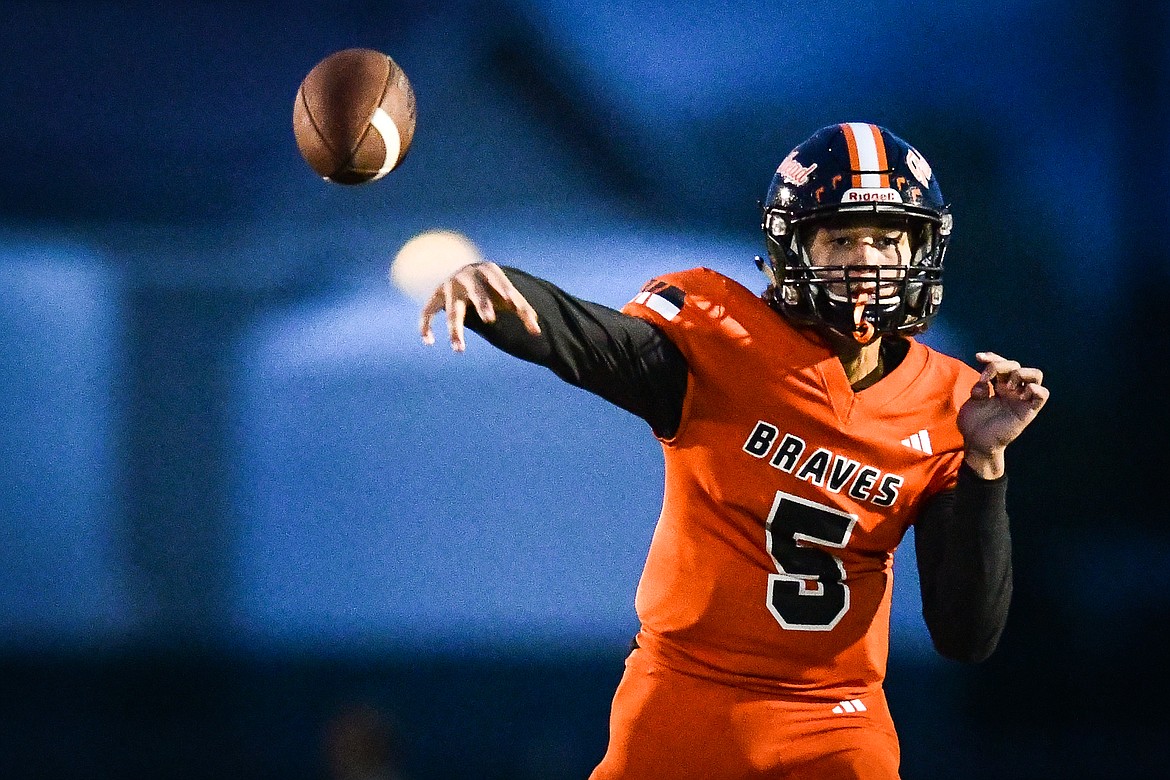 Flathead quarterback Kaleb Sims (5) drops back to pass in the third quarter against Butte at Legends Stadium on Friday, Sept. 22. (Casey Kreider/Daily Inter Lake)