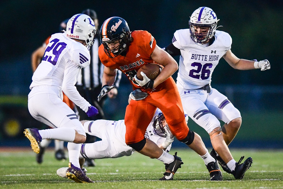 Flathead tight end Gabe Sims (84) picks up yardage after a reception in the third quarter against Butte at Legends Stadium on Friday, Sept. 22. (Casey Kreider/Daily Inter Lake)