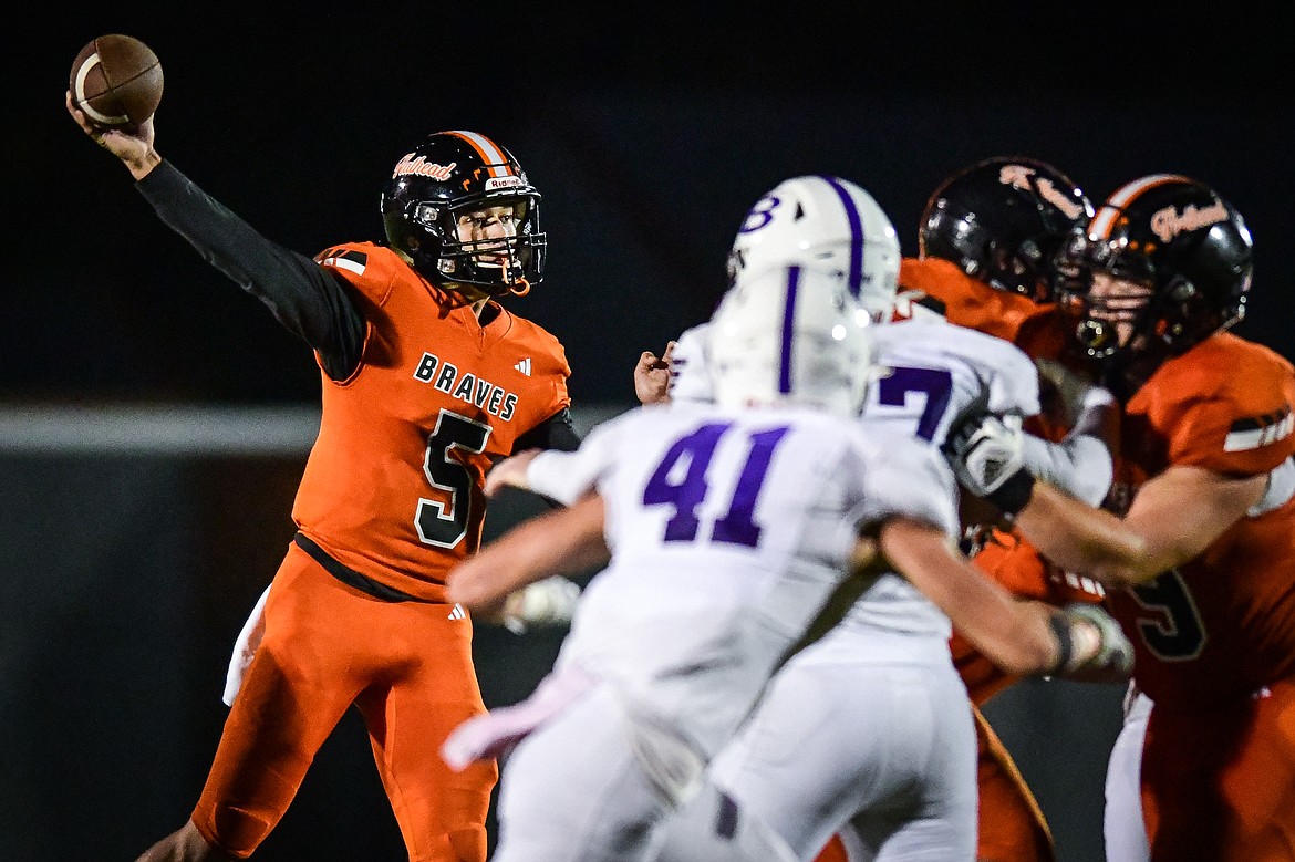 Flathead quarterback Kaleb Sims (5) drops back to pass in the fourth quarter against Butte at Legends Stadium on Friday, Sept. 22. (Casey Kreider/Daily Inter Lake)