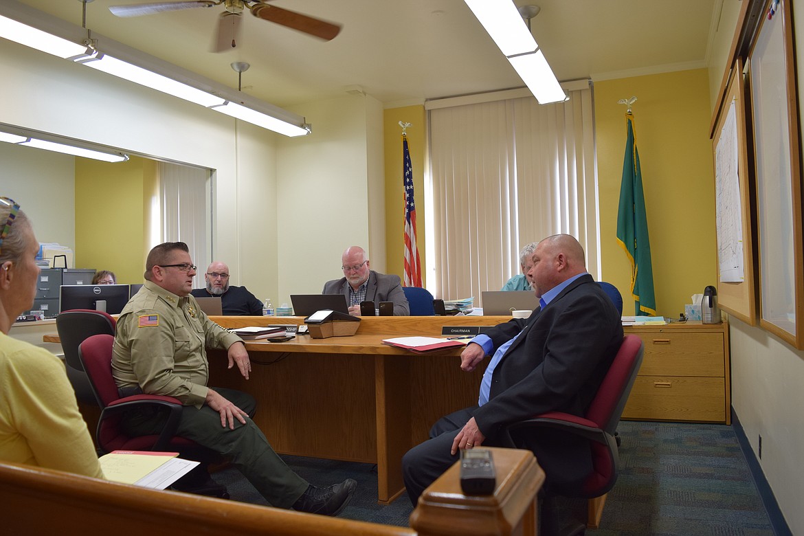 From left, Adams County Sheriff Dale Wagner, Adams County Commissioners Mike Garza and Dan Blankenship and Adams County Prosecutor Randy Flyckt discuss the Adams County Jail and what it will take to reopen it during a commissioner's meeting in February.