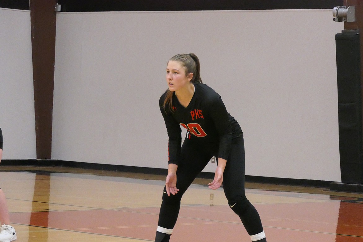 Trotters senior Blakely Lakko waits for a dig attempt during Plains' game versus Darby Thursday night in Plains. (Chuck Bandel/VP-MI)