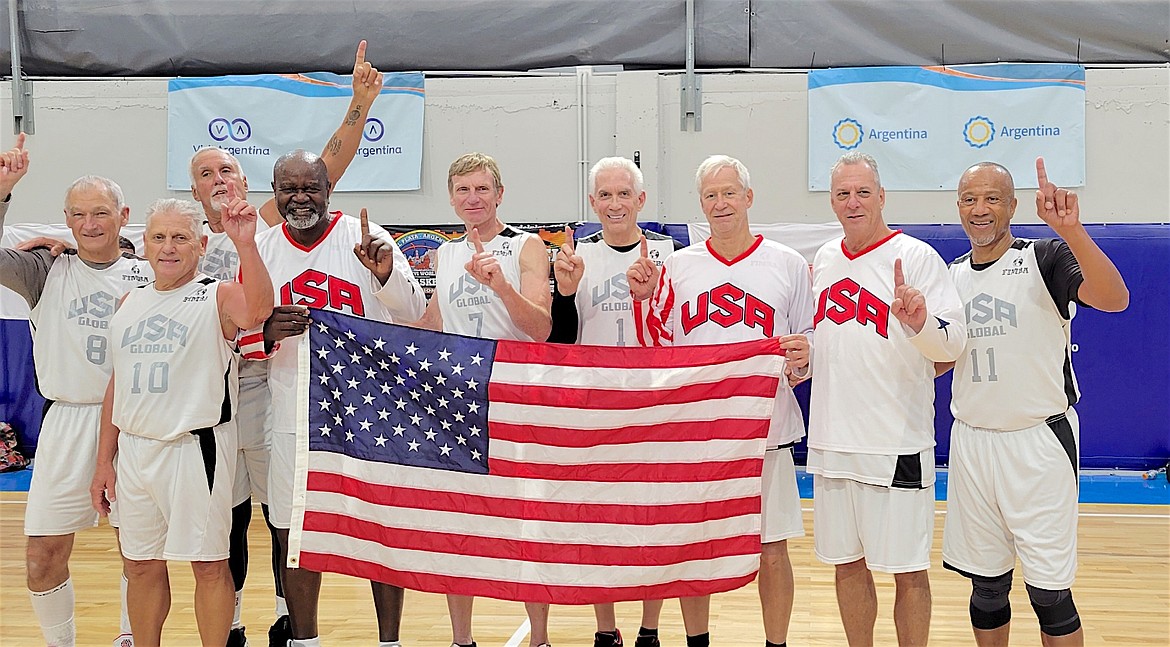 Polson's Terry Souhrada (no. 8) celebrates the win with the USA Global 65+ Team that beat Brazil in the World Championship Tourney. The players on the team hailed from Florida, Pennsylvania, Arizona, North Carolina, Texas and Montana.
