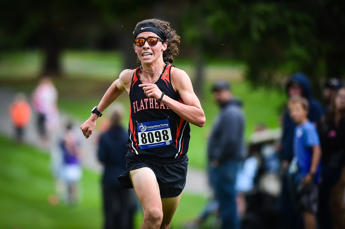 Flathead's Robbie Nuila pushes up the last incline toward a first-place finish in the boys race at the Whitefish Invite at Whitefish Lake Golf Club on Tuesday, Sept. 26. (Casey Kreider/Daily Inter Lake)