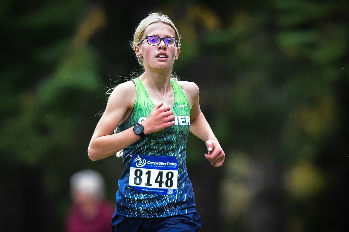 Glacier's Lauren Bissen nears the finish line in the girls race during the Whitefish Invite at Whitefish Lake Golf Club on Tuesday, Sept. 26. (Casey Kreider/Daily Inter Lake)