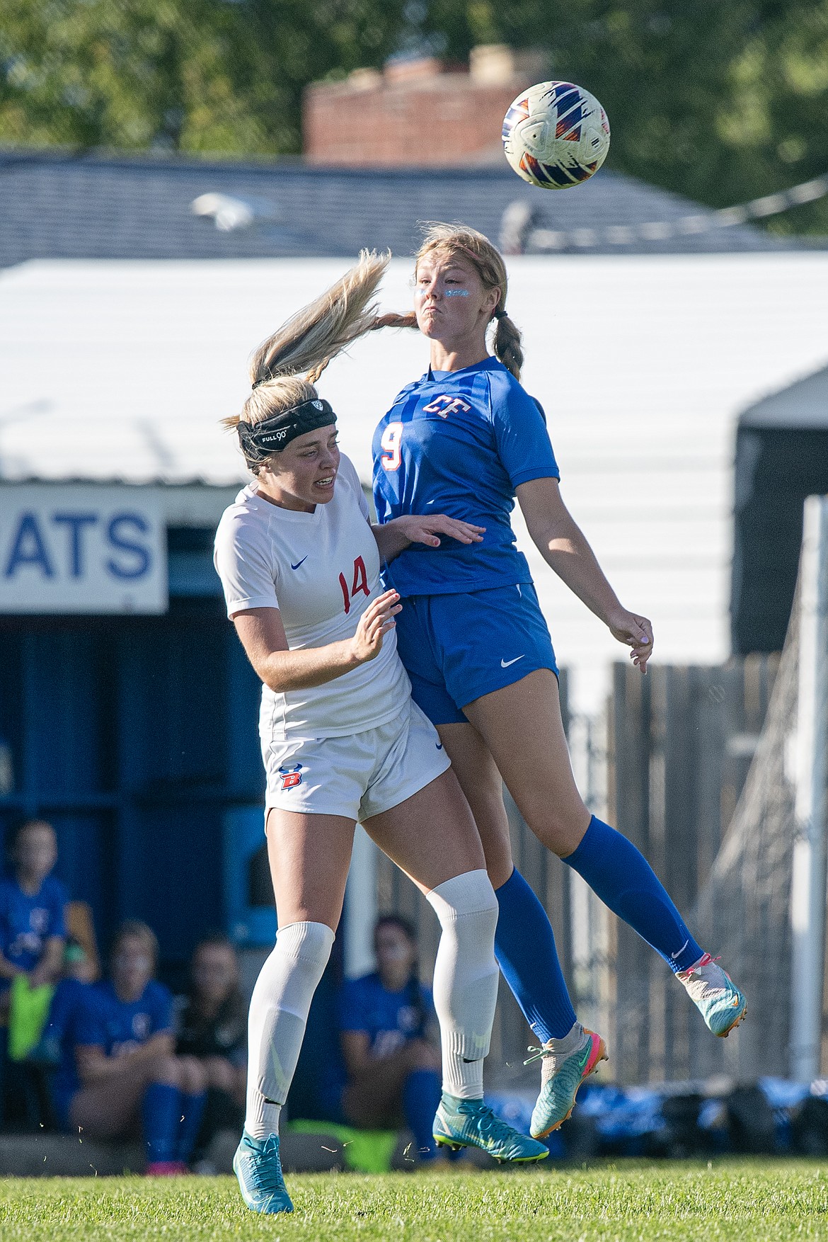 Hope McAtee (9) takes a header in the Wildcats’ Homecoming game against Bigfork on Saturday, Sept. 23. The girls tied 2-2. (Avery Howe photo).