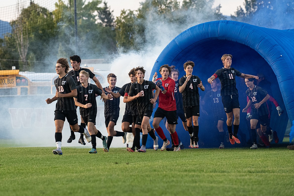 The Wildcats boys soccer team makes an entrance for their nonconference Homecoming match against Stillwater Christian School on Saturday, Sept. 23. Columbia Falls won 2-1. (Avery Howe photo)