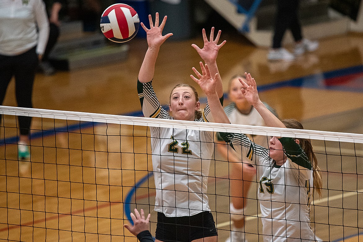 Brooke Zetooney and Bailey Smith go up for the block against the Wildkats on Thursday, Sept. 21. The Bulldogs won in four sets. (Avery Howe/Hungry Horse News)