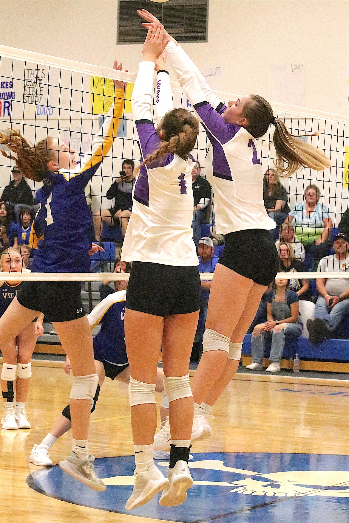 Charlo's Seeley McDonald and Aida Cote block the ball during last week's game against Victor, which the Lady Vikings won. (Michelle Sharbono photo)