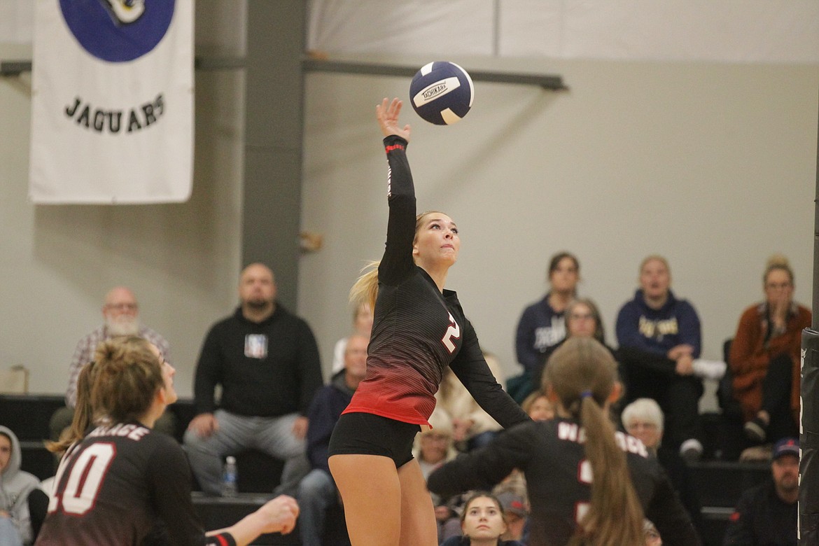 MARK NELKE/Press
Megan Hull of Wallace swings away during a four-set victory over Genesis Prep on Tuesday night at The Courts at Real Life in Post Falls.