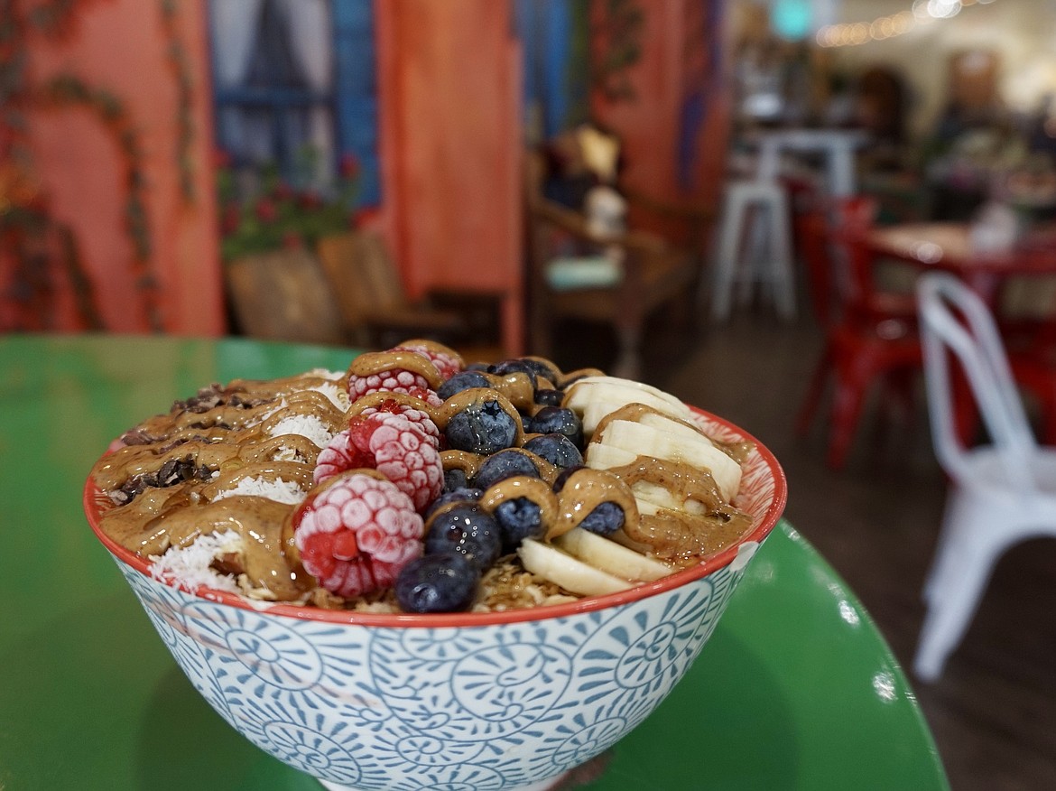 Natalie's Survivor acai bowl at Huck’s Place includes almond milk, spinach, banana, mixed berries, flax seed spirulina, cinnamon and almond butter. (Summer Zalesky/Daily Inter Lake)