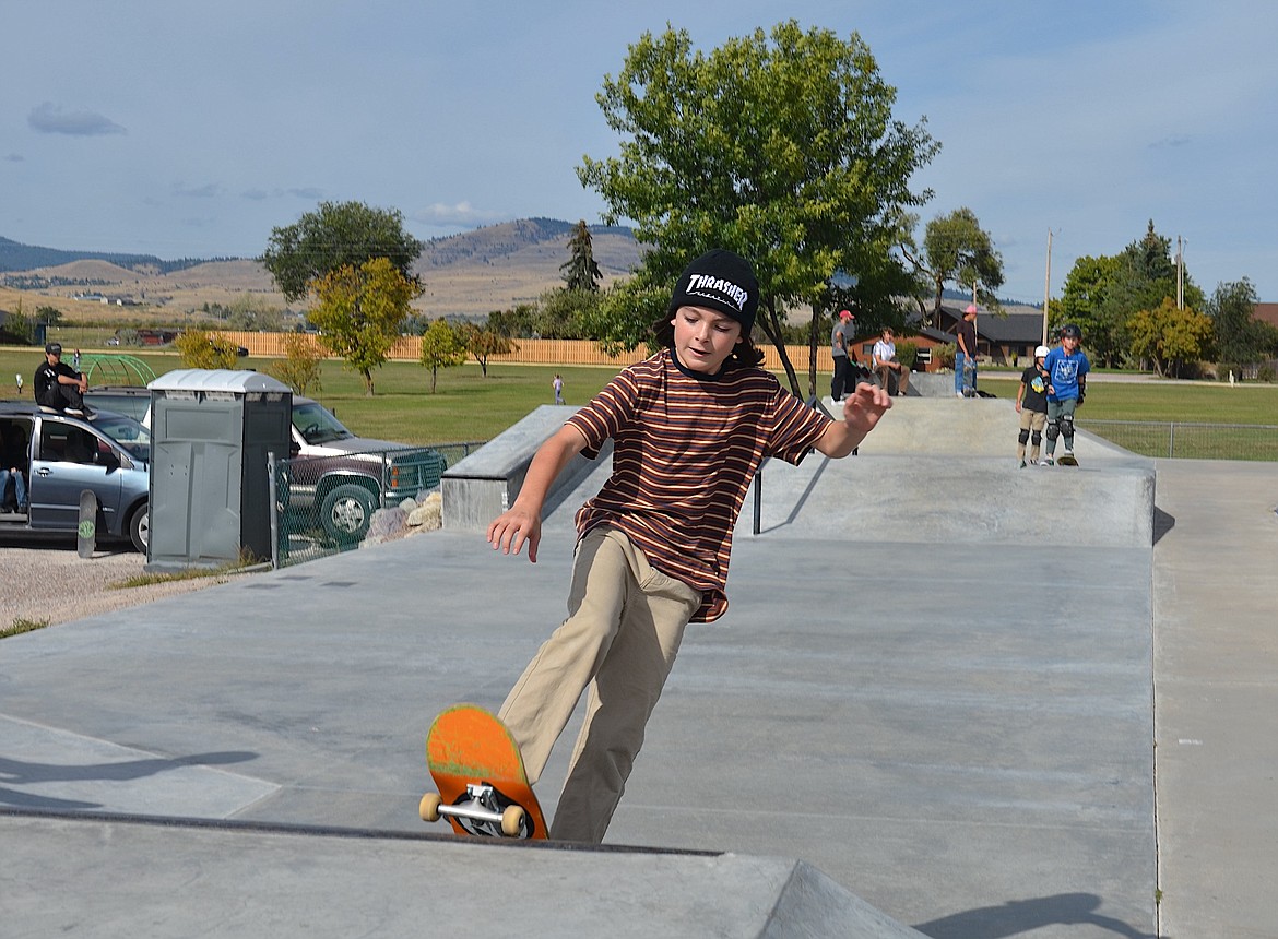 Cheerful boarder finishes up a run at Saturday's Skate Jam in Polson. (Kristi Niemeyer/Leader0