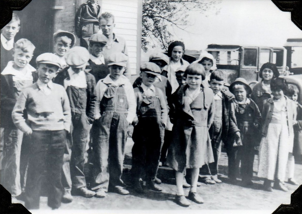 Cayuse Prairie School students gather for a group photo in this photo that was thought to have been taken around 1934. (Photo provided by Cayuse Prairie School)