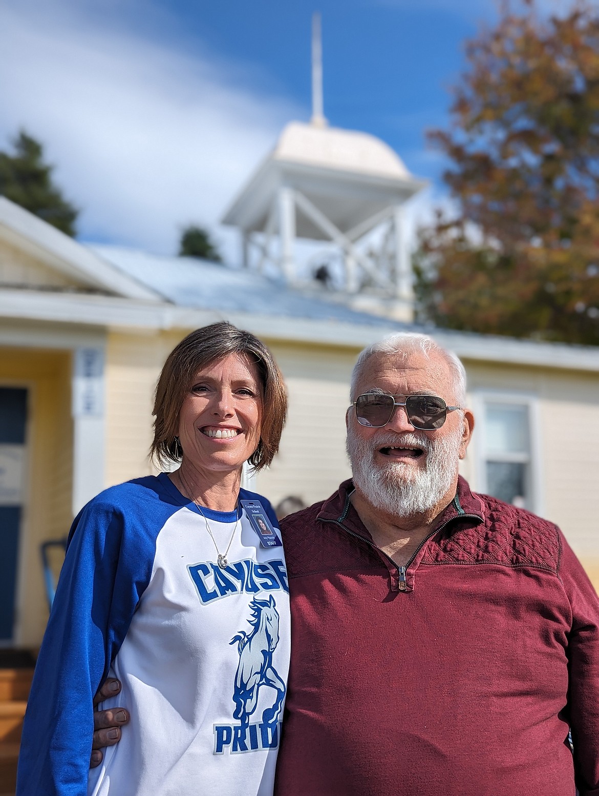 Current Cayuse Prairie School Principal Amy Piazzola and former principal Mr. Babcock at the school's 125th anniversary celebration. (Photo by Jody Harp)