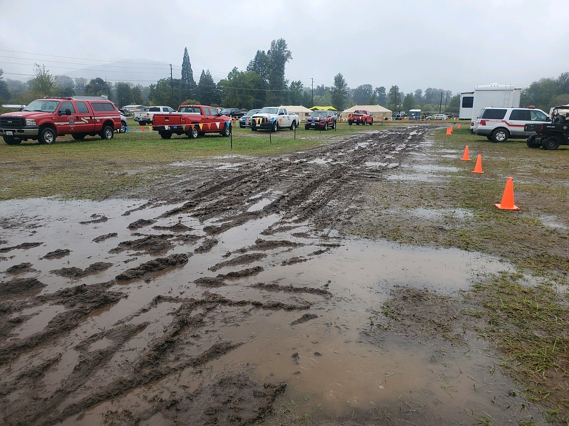 The ground at the Incident Command Post for the Cowlitz Complex of fires was muddy Wednesday after an inch of rain fell on the area.