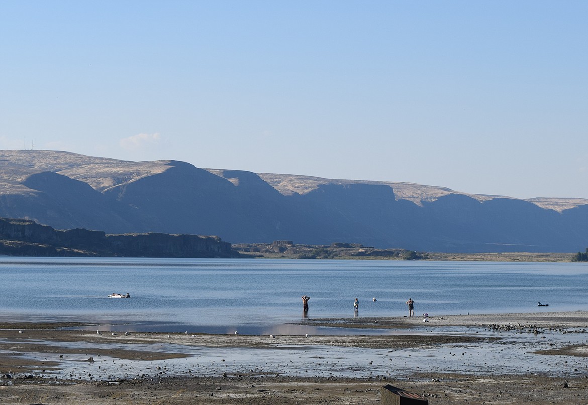 Beach-goers enjoy the water at Soap Lake’s south end early in September, despite the obviously-low water levels. On Monday, the lake’s elevation was the lowest ever recorded by the United States Geological Survey.