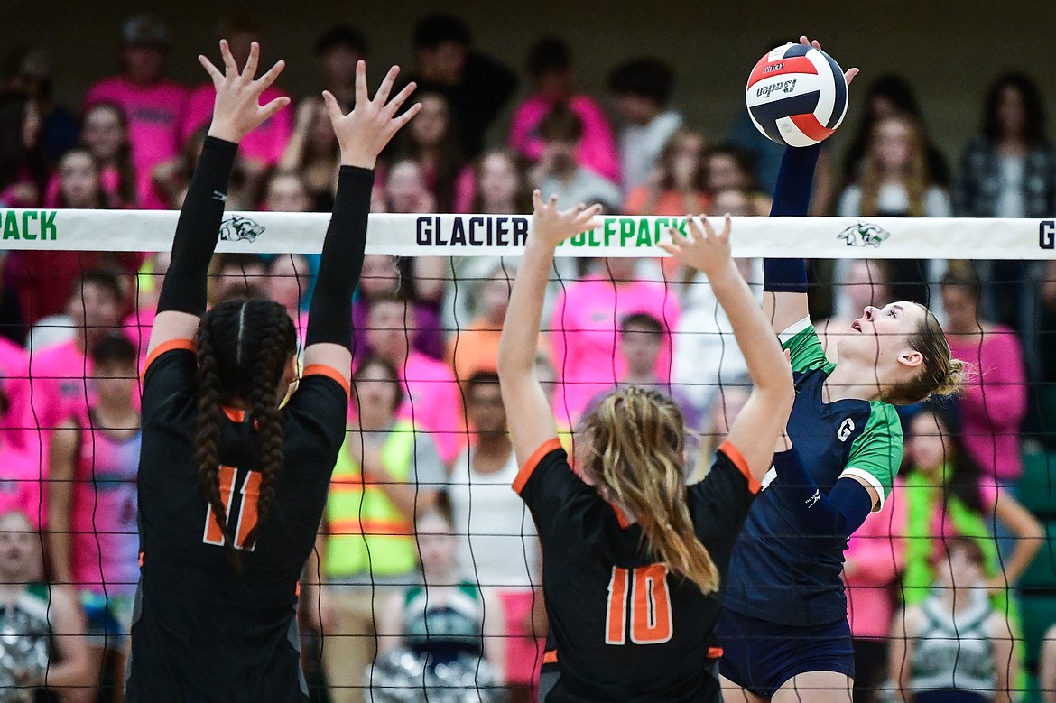 Glacier's Sarah Downs (7) goes to the net for a kill against Flathead at Glacier High School on Thursday, Sept. 28. (Casey Kreider/Daily Inter Lake)