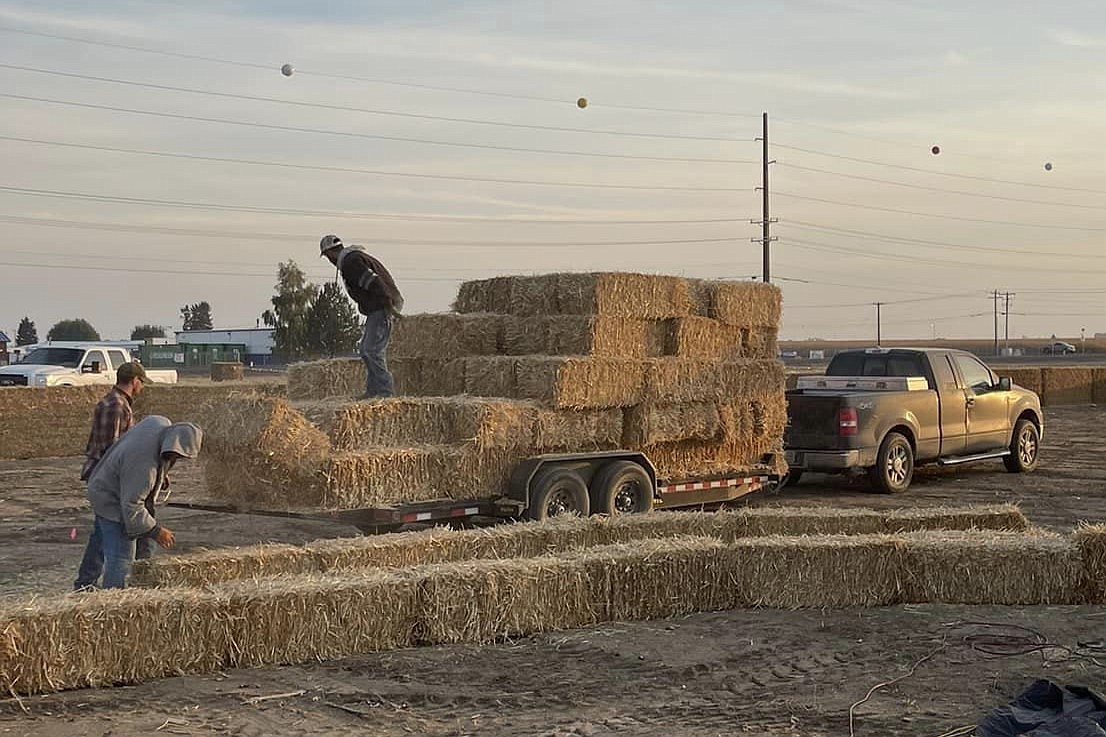 Event organizers set up the 2022 StrawBelly’s Straw Maze in Moses Lake.