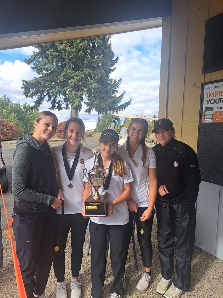 The Sandpoint girls golf team poses with their first-place medals and trophy after winning the 4A district championship Thursday. Pictured, left to right, Demi Driggs, Raegan Samuels, Taylor Mire, Claire Loutzenhiser, and Alexa Tuinstra