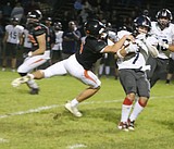 Not the Trojans' night .. Turnovers plague Post Falls in loss to Mt. Spokane