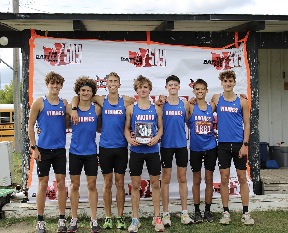 Courtesy photo
The Coeur d'Alene High boys cross country team won the Battle for the 509 team title in the Black Division on Saturday at the Spokane Polo Grounds. From left are Max Cervi-Skinner, Kyle Rohlinger, Jacob King, Lachlan May, Wyatt Carr, Mitchell Rietze, and Zack Cervi-Skinner.