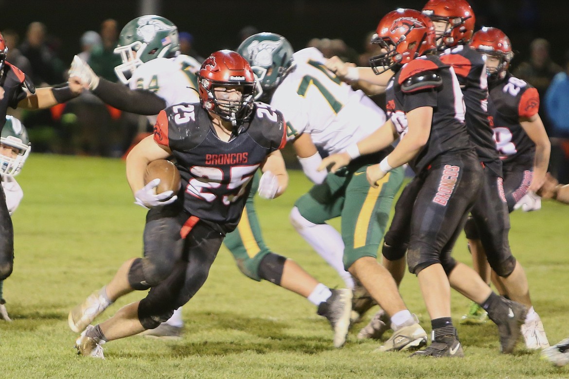 Lind-Ritzville/Sprague junior Brody Boness (25) carries the ball against Northwest Christian on Friday.