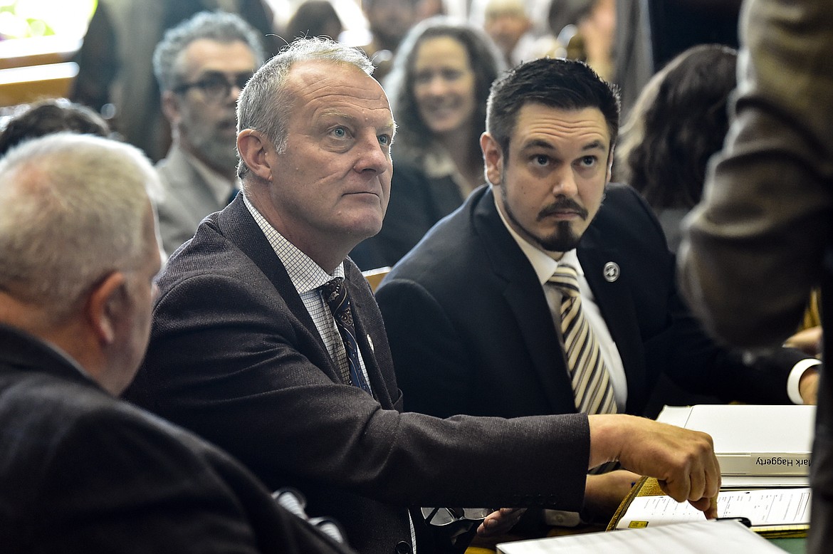 Attorneys for the State of Montana are seen before a hearing in the climate change lawsuit, Held vs. Montana, at the Lewis and Clark County Courthouse on June 20, 2023, in Helena, Mont. The office of Montana's Republican attorney general is appealing a landmark ruling in the case from a state judge who said officials weren’t doing enough to protect the plaintiffs from the harms of global warming. (Thom Bridge/Independent Record via AP, file)