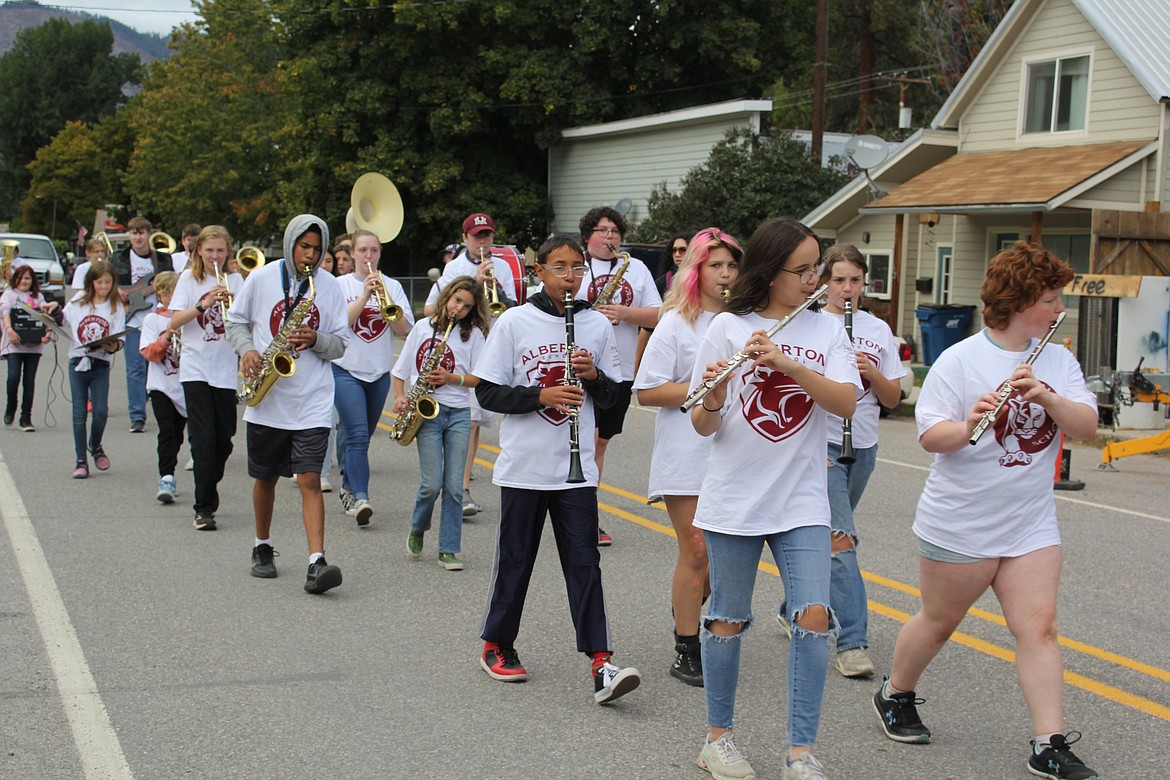 The marching band performs in the Alberton homecoming parade. (Monte Turner/Mineral Independent)