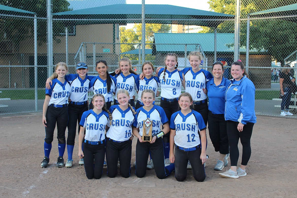 Courtesy photo
The Coeur d’Alene Crush took second place in the 14U Gold Bracket at the D-BAT Fall Classic Showcase softball tournament in the Tri-Cities last weekend, with a 4-1 record. In the front row from left are Molly Nelson, Madeline Peterson, Maddy Pratt and Jenna Davenport; and back row from left, Macy Waterhouse, Paityn Froman, Jaiden Corbey, Reese Vanek, Ada Blakemore, Rylan Morrison, Sophia Piekarski, coach Patti Davenport and coach Bailey Cavanagh.