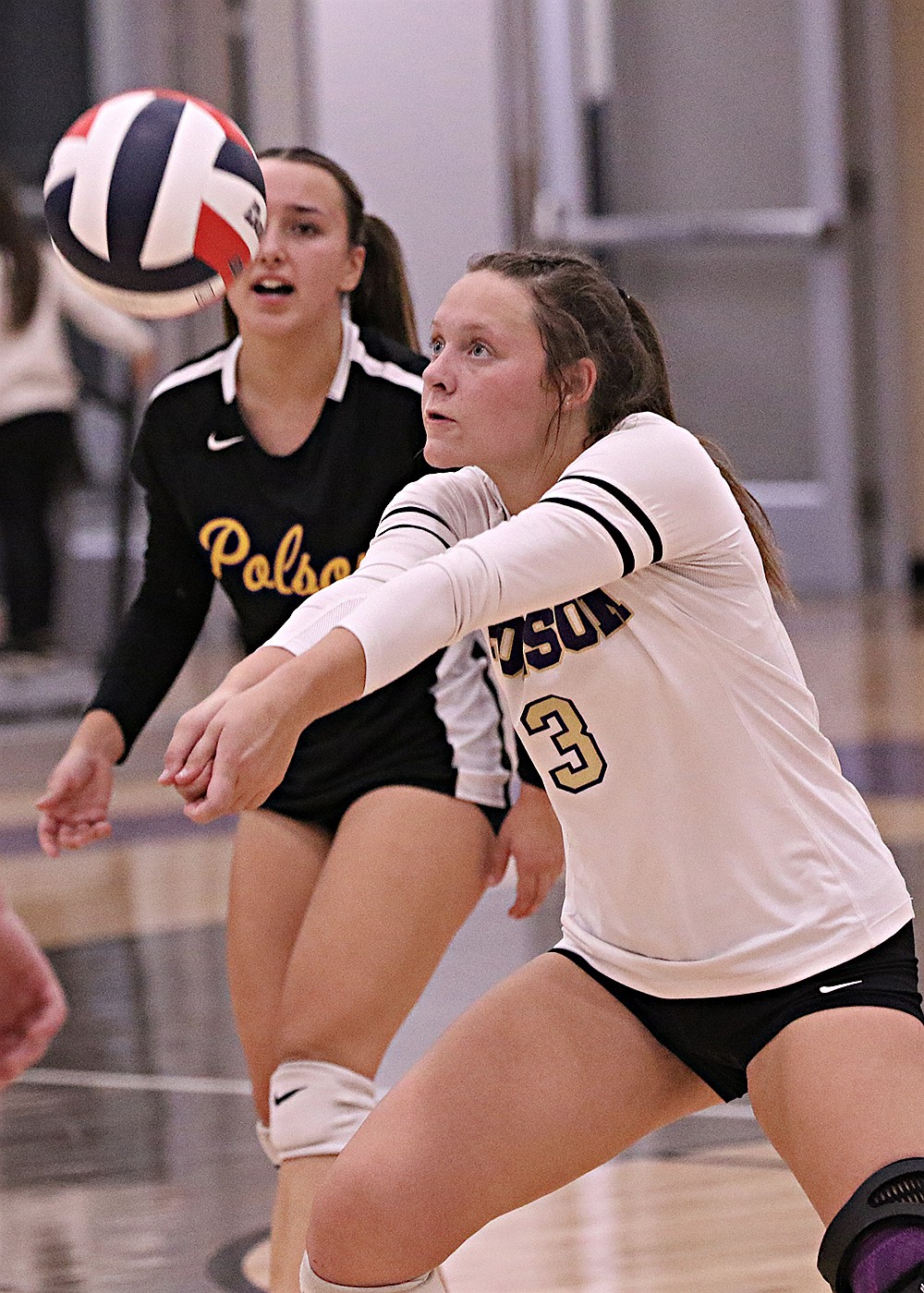 Lady Pirate Mckenna Hanson contributes to Polson's 58 team digs against Browning. (Bob Gunderson photo)