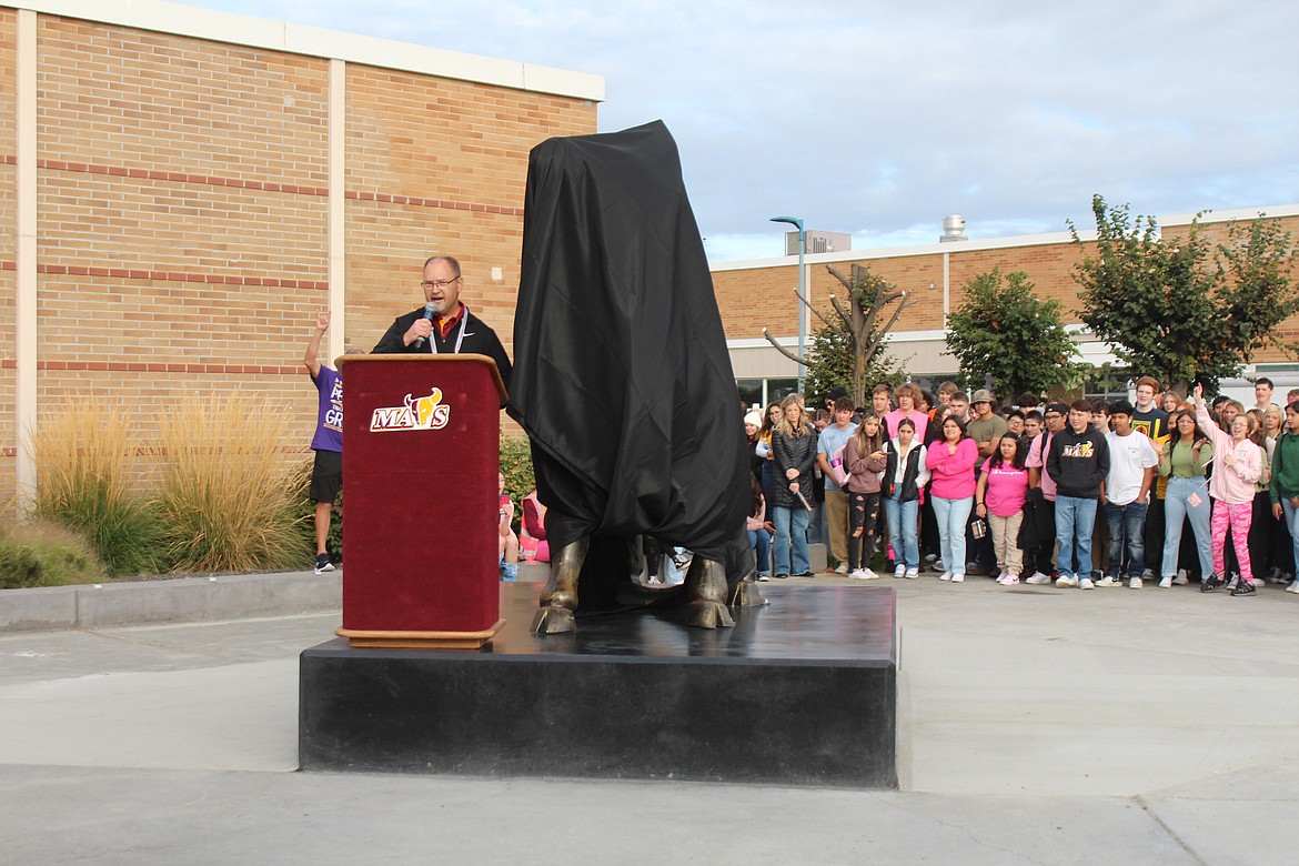 Moses Lake High School Athletic Director Loren Sandhop gives a little bit of school history before the new mascot is revealed.