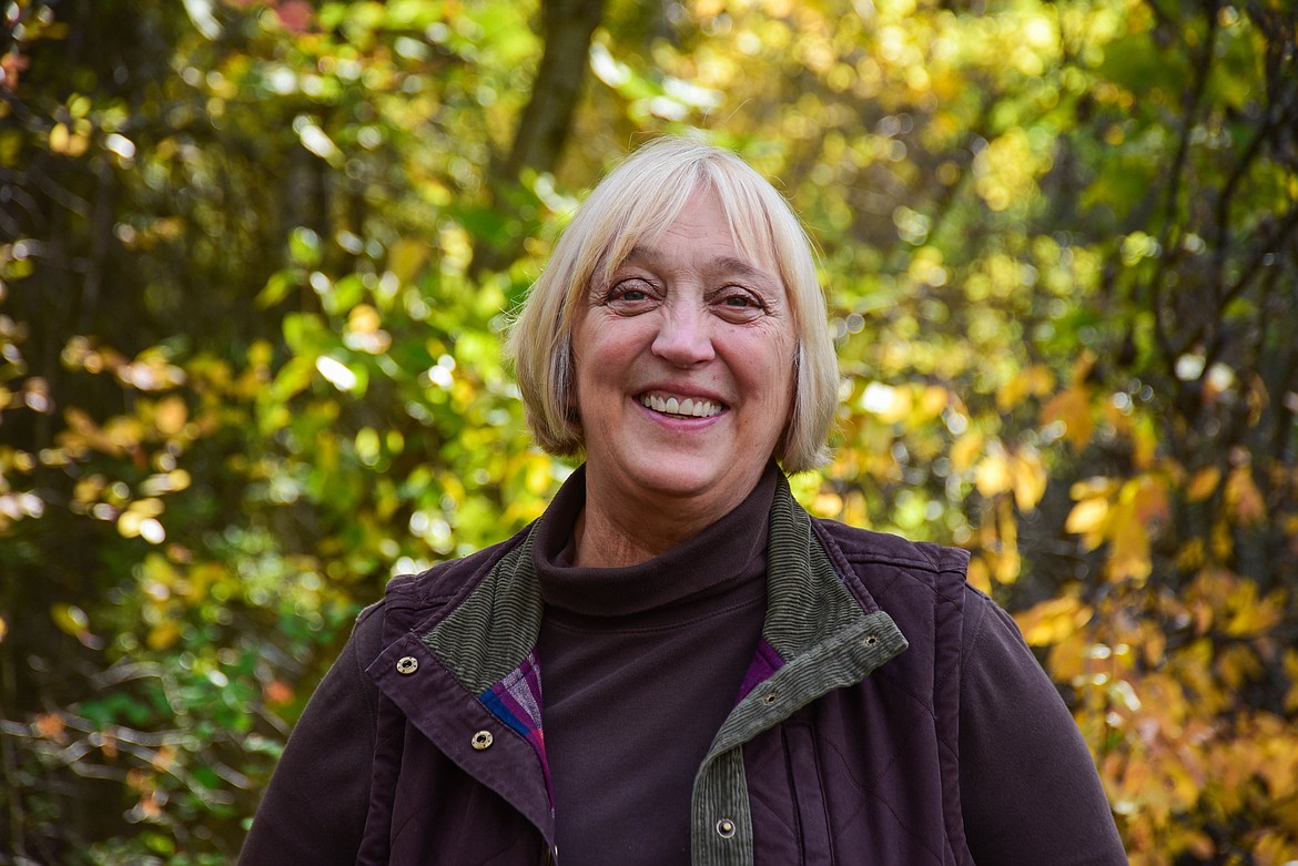 Darcy Thomas, the newly elected president of the Flathead Audubon Society, stands in Owen Sowerwine Natural Area. (Kate Heston/Daily Inter Lake)