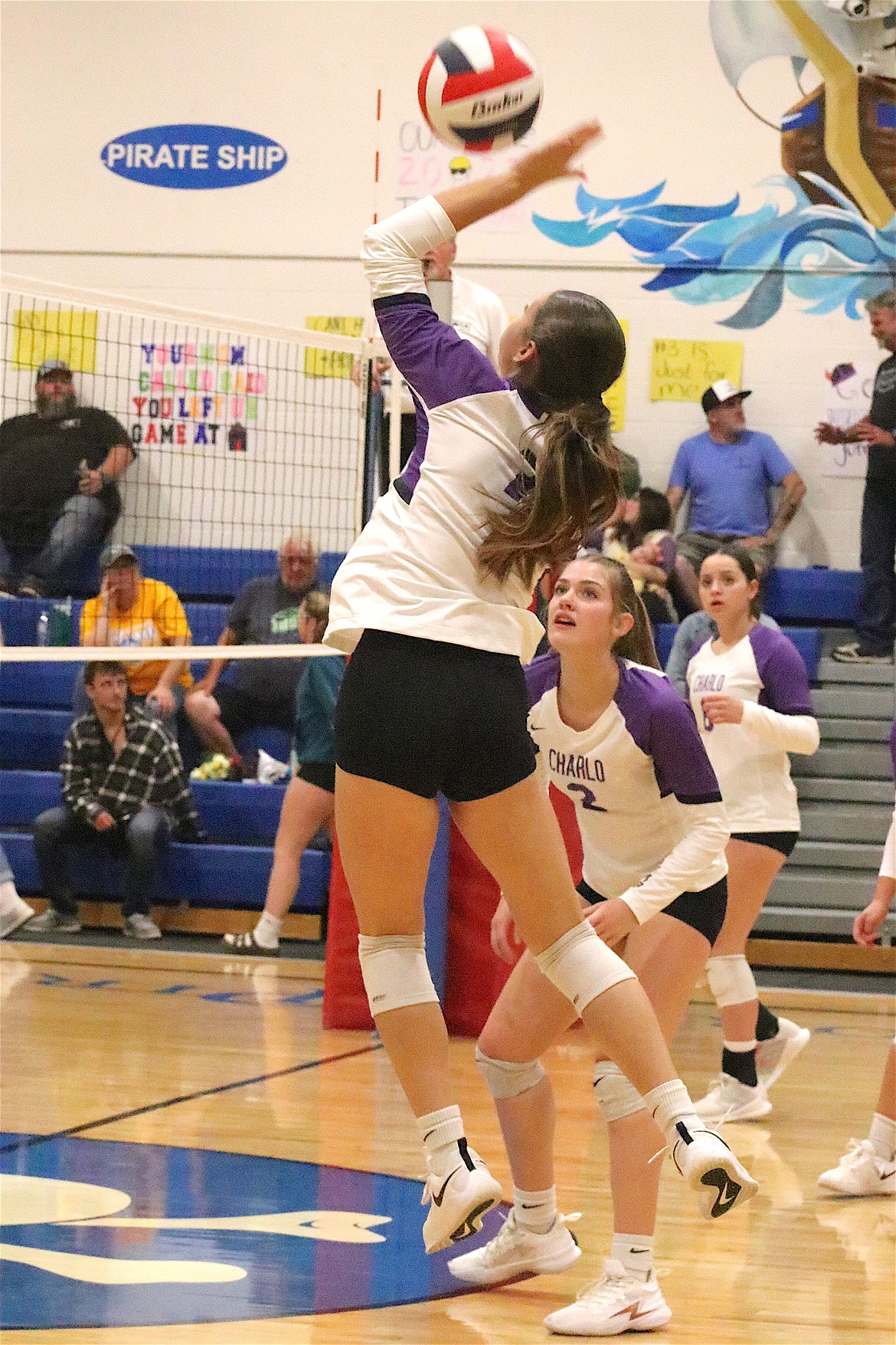 Charlo's GG Hawk pounces on the ball during the Lady Vikings' three-set sweep of Victor. (Michelle Sharbono photo)