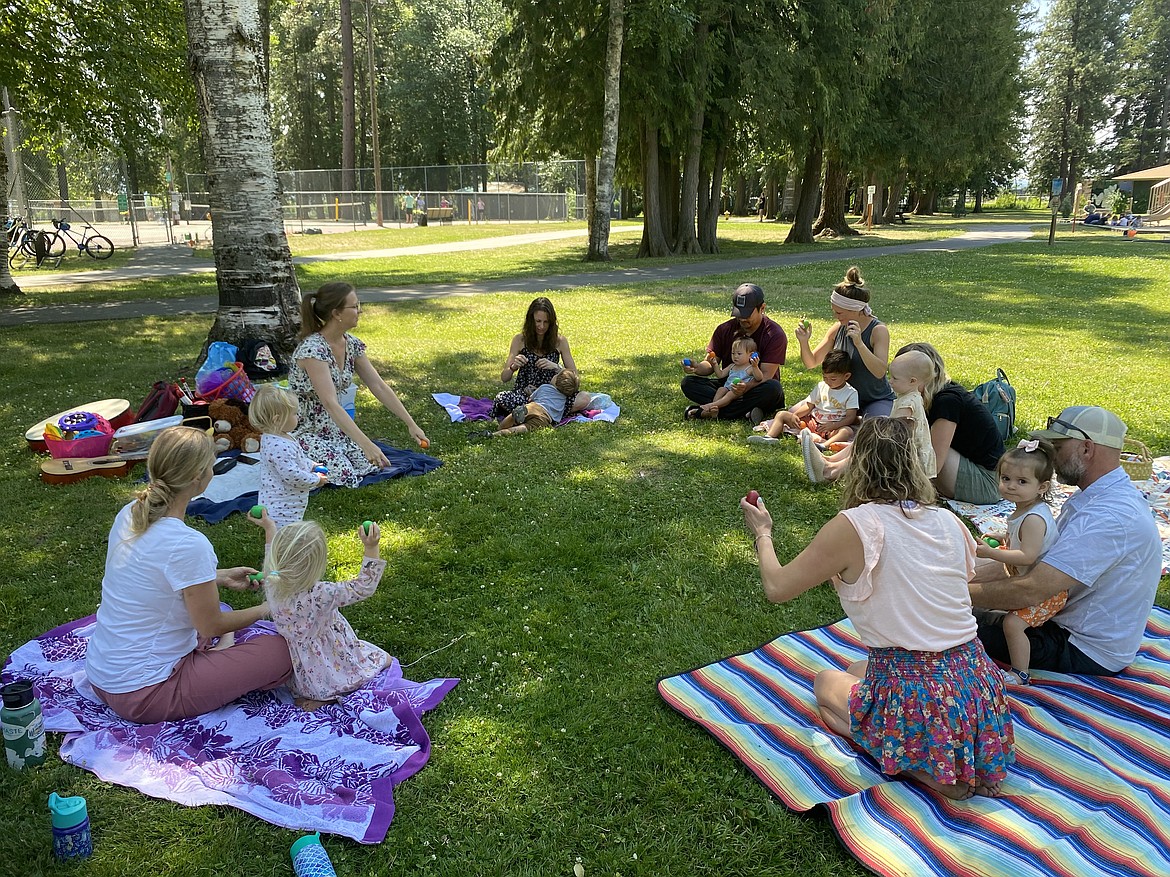 A Little Mozarts class takes advantage of a nice day to hold class in the park. The Music Matters! program encompasses all ages from early childhood through high school and has creative instruction in choir, percussion, handbells, musical theater, and more.