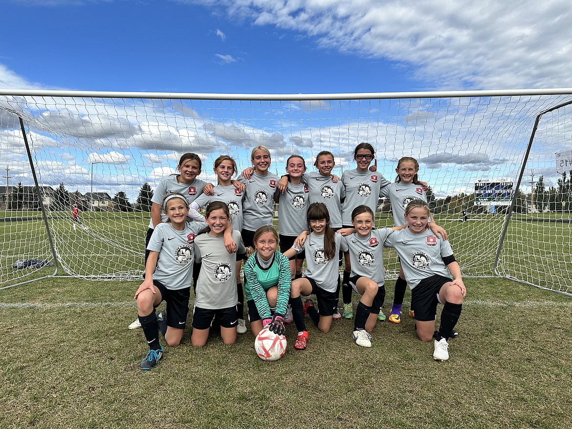 Courtesy photo
The Thorns 2013 girls took two teams to the Glacier Surf Premier Soccer Cup in Whitefish, Mont., last weekend. The Gold team went undefeated and took first place in the Gold Division, scoring 17 goals over the weekend and allowing only 3 goals. In the front row from left are Presley Hart, Emma Storlie, Nora Snyder, Sophia Quigley, Nevie Sousley and Nora Schock; and back row from left, Felicity Miller, Kinsley Young, Kyal Carlson, Peyton Cantrell, Addison Salas, Kinsey Kiefer and Evellyn Howard.