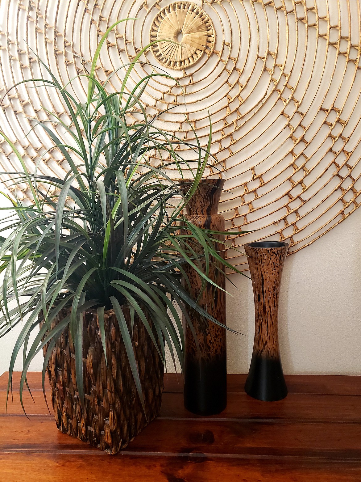 An array of odds and ends that Marji Naaz found in a thrift store. The wooden vases were found in different stores, though they match her style perfectly.