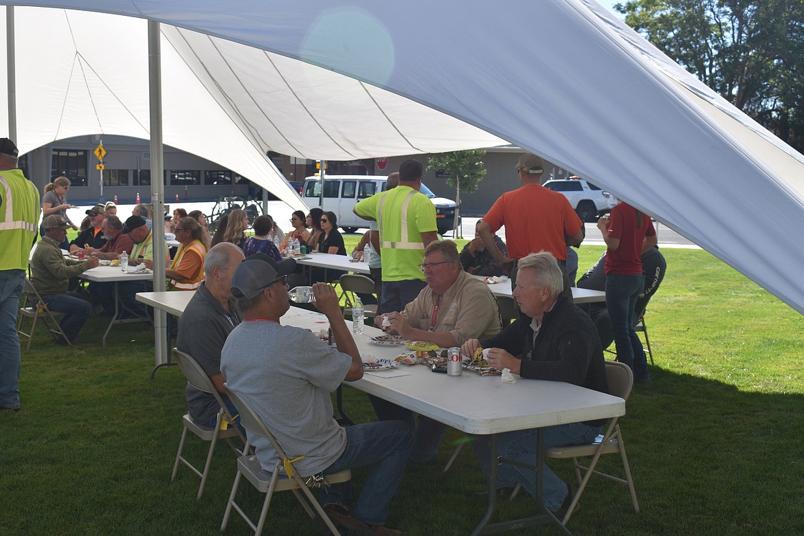 County staff, including Grant County Fairgrounds Director Jim McKiernan, seated at far right, enjoy a meal together during Wednesday’s appreciation event put on by elected officials from throughout Grant County.