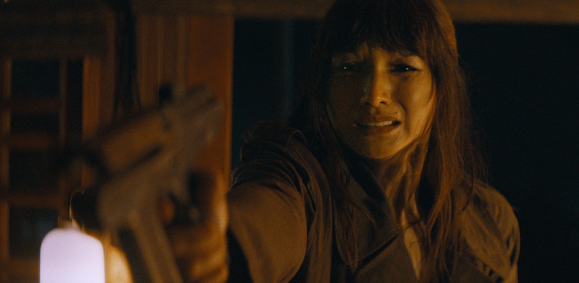 This image shows Gemma Chan in a scene from "The Creator."