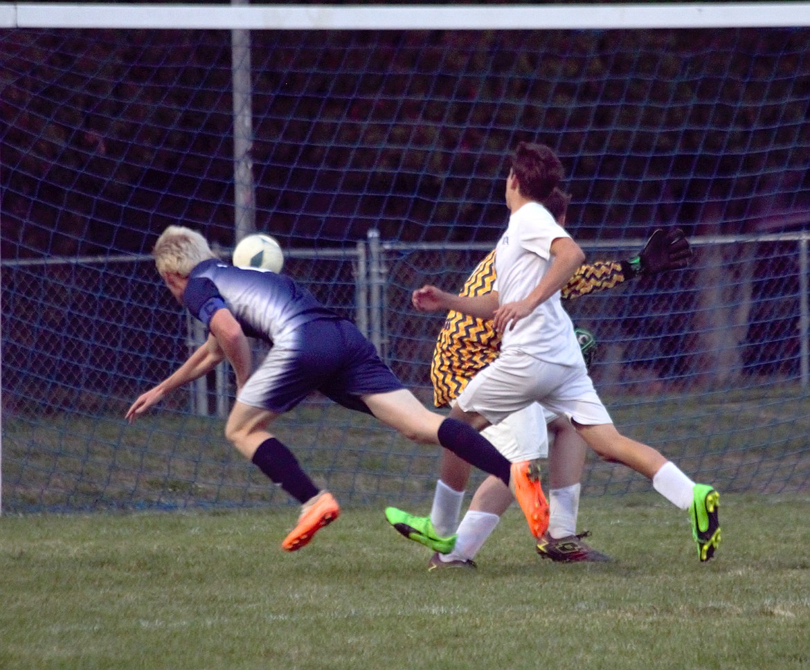 PREP SOCCER Newell scores four goals, girls has closest game against