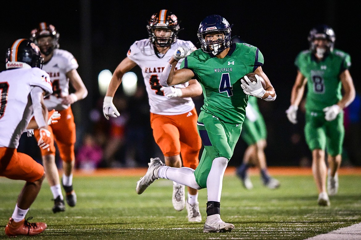 Glacier wide receiver Kole Johnson (4) picks up yardage after a reception in the second quarter against Flathead at Legends Stadium on Thursday, Oct. 5. (Casey Kreider/Daily Inter Lake)